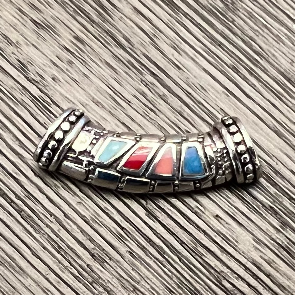 Silver Slide with multiple stones.